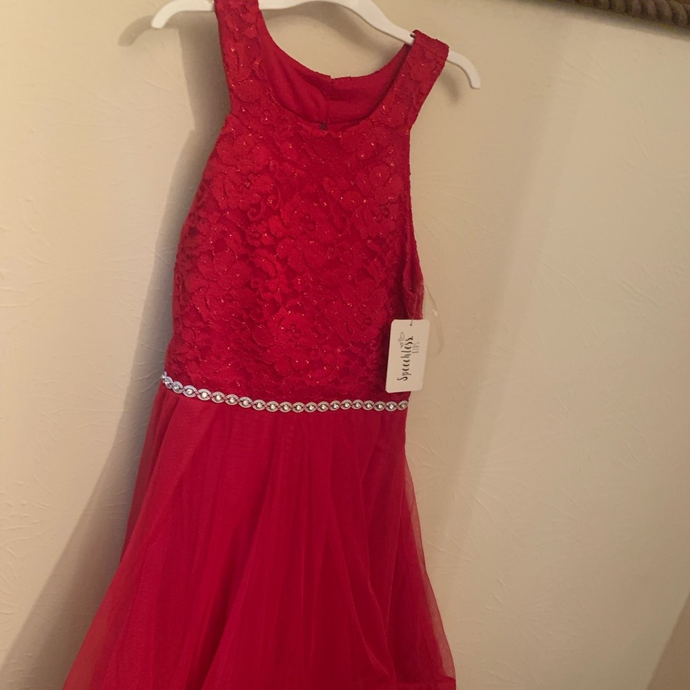 Red lace to tulle dress with jeweled waistline